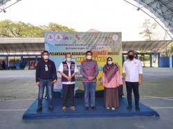 Bersama OJK dan Kadin Riau, Kadin Pekanbaru Gelar Vaksinasi Massal