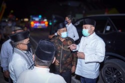 Bupati Catur Hadiri PHBI d Desa Padang Luas Tambang