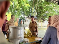 Bupati Kampar Perkuat Sinergi Perbankan dan UMKM untuk Dorong Ekonomi Kerakyatan