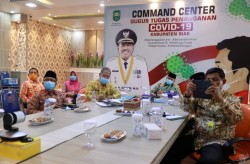 Bupati Siak Ikuti VidCon Dengan Kementrian, Dengarkan Arahan PSBB dan Penanganan Covid-19