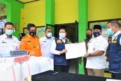 Disebut Belum Bagikan 100.000 Masker dari Gubri, Berikut Klarifikasi Satgas Covid-19 Kampar