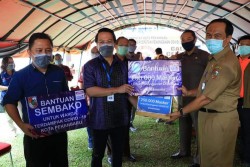 Indomaret Serahkan Bantuan ke Pemko Pekanbaru