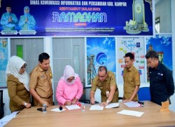 Kepala Diskominfo dan Persandian Kampar Gelar Tandatangan MoU dengan Beberapa Media Pers