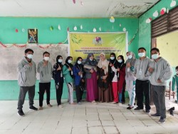 Mahasiswa KKN UIN Suska Riau Bersama Dosen UP Sosialisasikan Covid-19 di SD 002 Desa Kuapan