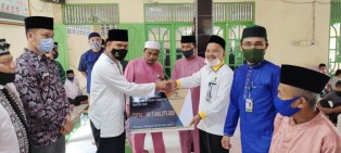 Pjs Bupati Siak Hadiri Penyaluran Zakat di Kecamatan Lubuk Dalam