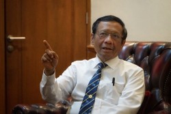 Polda Jatim Tetapkan Pembuat Video Pengancaman Mahfud MD Jadi Tersangka