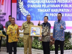 Predikat Kepatuhan Standar Pelayanan Publik Tahun 2022 Didapat PJ Bupati Kampar