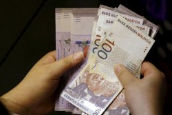 Ringgit Dominasi Penukaran Mata Uang di Lhokseumawe