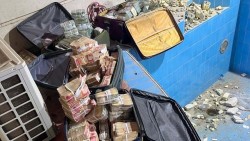 Skandal Korupsi Irak Terbongkar, Rp430 Miliar Disembunyikan di Botol Air Mineral