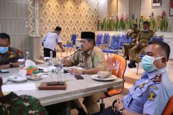 Via Video Conference, Bupati Alfedri Laporkan Penanganan Wabah Covid 19 Kepada Gubernur Riau
